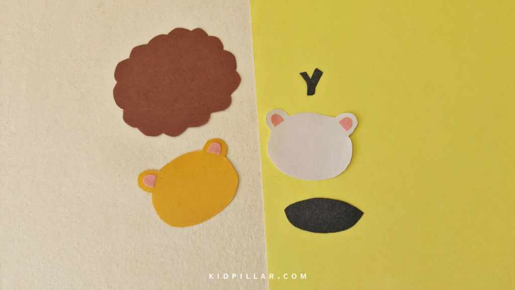 Paste ear cutouts for lion and zebra safari animals